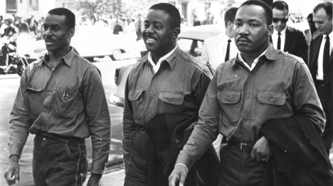 Rev. Ralph Abernathy (center) with the Rev. Fred Shuttlesworth (left) and MLK Jr. (right), defying an injunction against protesting on Good Friday in 1963. They were arrested and held in solitary confinement in the Birmingham jail where King wrote his famous "Letter From Birmingham Jail." (Courtesy of Birmingham Public Library Archives)